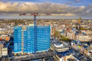 Construction crane building high rise apartment