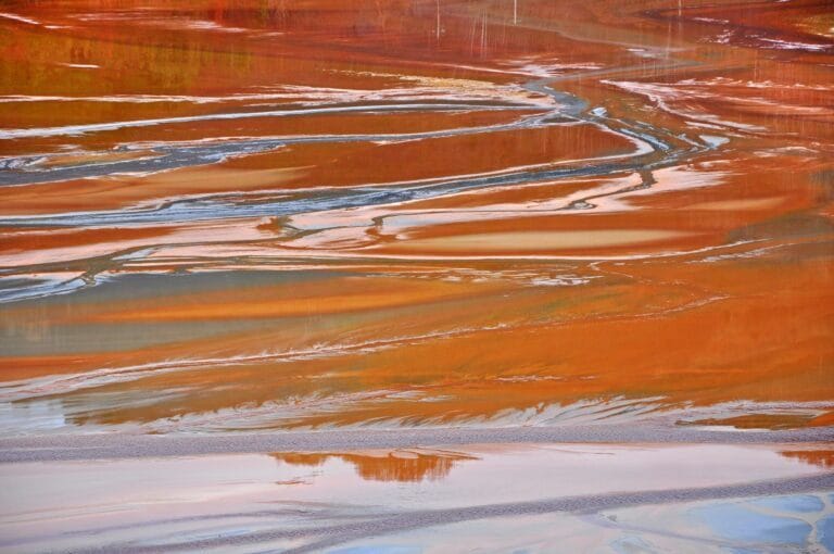 Pollution of a lake with contaminated water. Rosia Montana, Romania