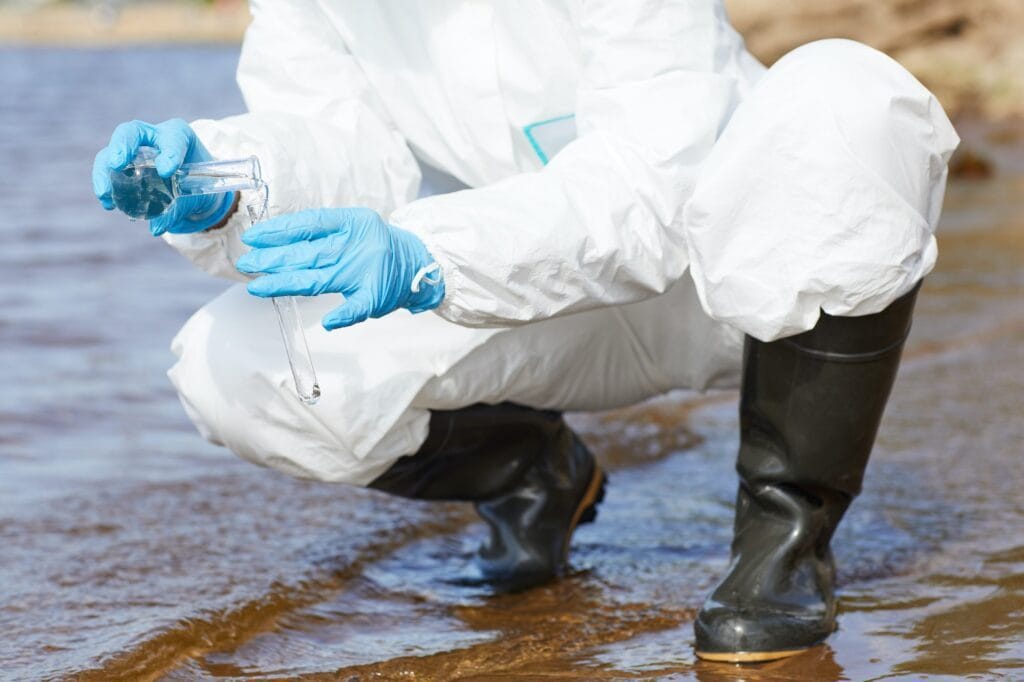 Chemist examining water
