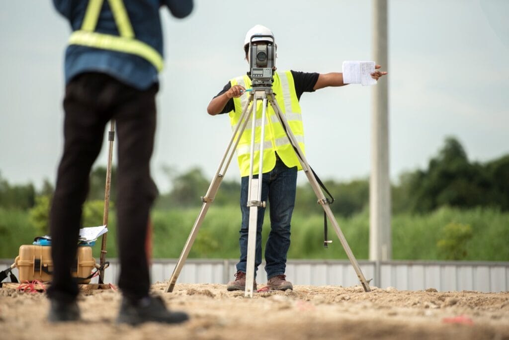 specialists conducting a land survey