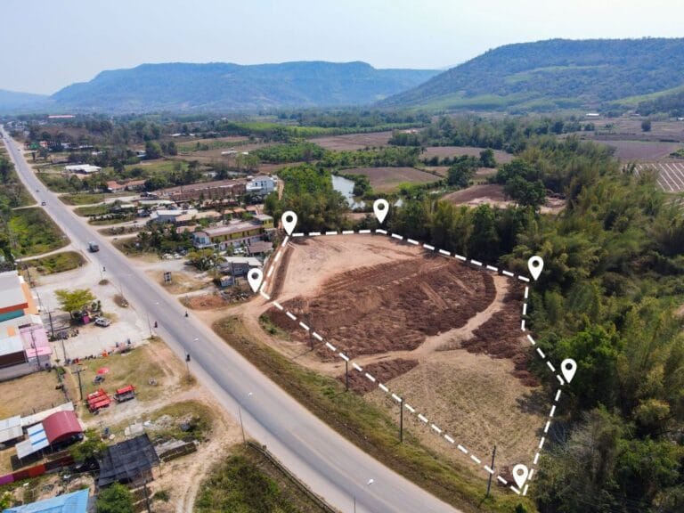 An aerial view of a piece of property showing the boundary lines on a plot of land.