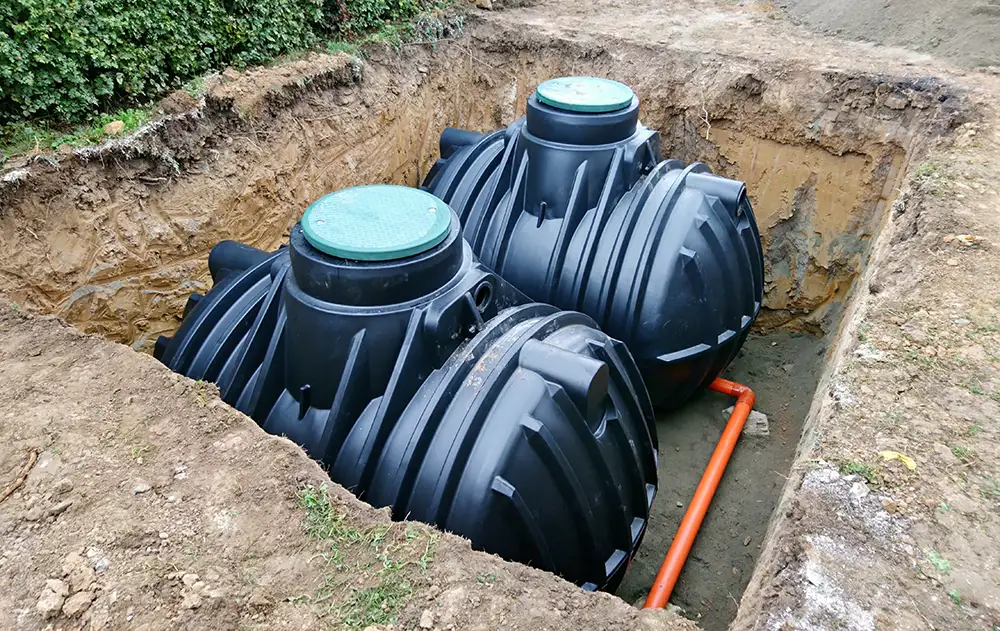 Navigating Septic System Design in Utah: A Comprehensive Guide to Permitting, Soil Testing, and Regulatory Approvals 3 Two plastic, underground water septic tanks,