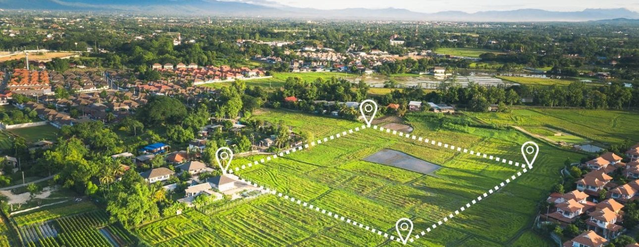 An image of a plot of land with clear markers added on by a surveying program.