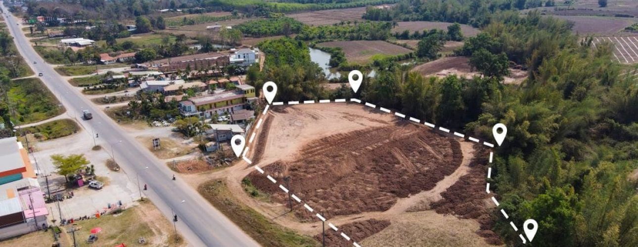 An aerial view of a piece of property showing the boundary lines on a plot of land.