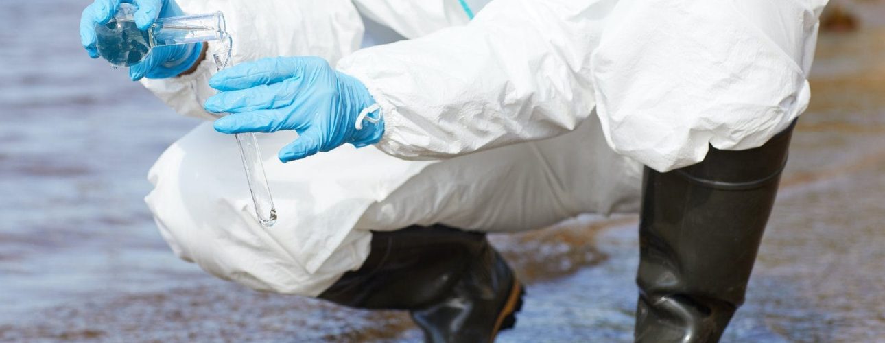 Chemist examining water