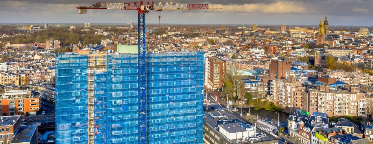 Construction crane building high rise apartment