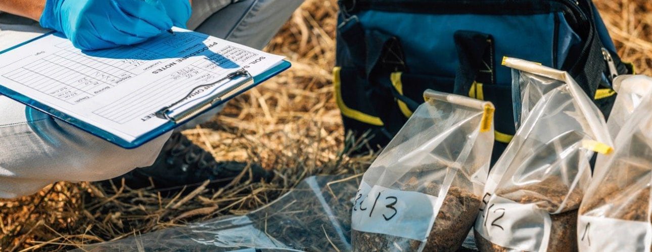 surveyor testing soil samples