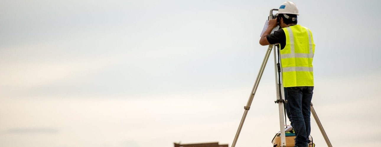 engineer conducting a land survey